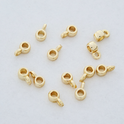 Krawatka oponka z mosiądzu w kolorze złotym 6,5x4mm