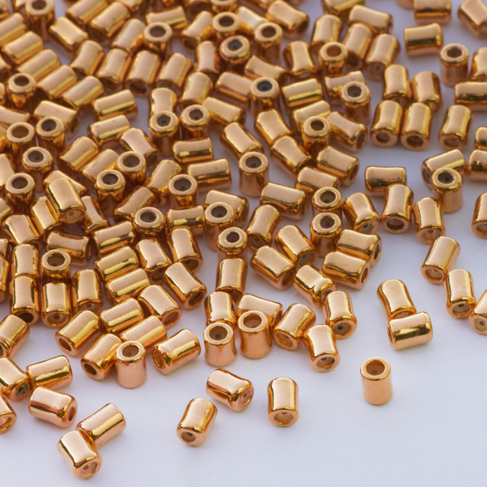 Zapięcie stoper z silikonem do cienkich sznureczków walec złoty 4x3mm